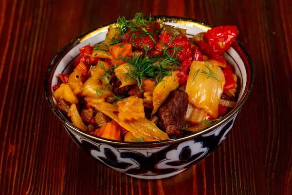 Uzbek traditional lagman over wooden background — Stock Image Uzbek Traditional Lagman Wooden Background Stock Photo