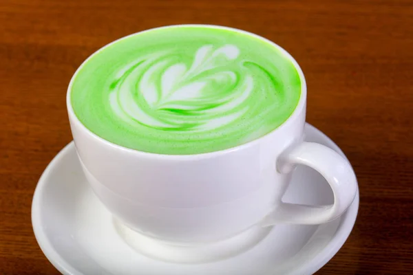 Hot Green cappuccino with cream