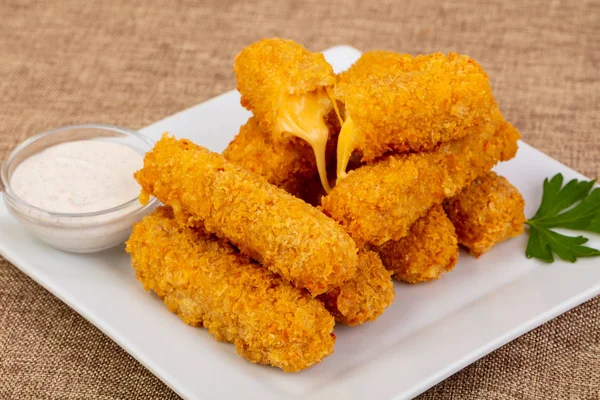 Fried cheese sticks with sauce