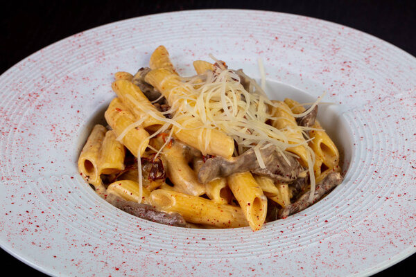 Delicious beef penne with cheese