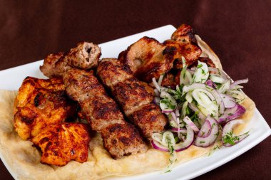 Mix shashlik plate kebab meat clipart