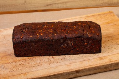 Ev yapımı lezzetli ekmek ahşap arka plan üzerine