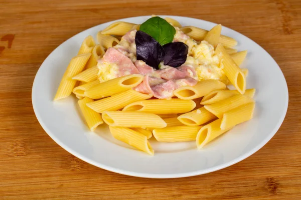 Pasta Penne Carbonara Served Basil Leaves — Stock Photo, Image
