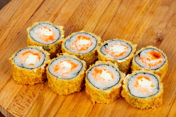 Hot roll with salmon and soft cheese