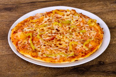 Pizza sarı dolmalık biber ile