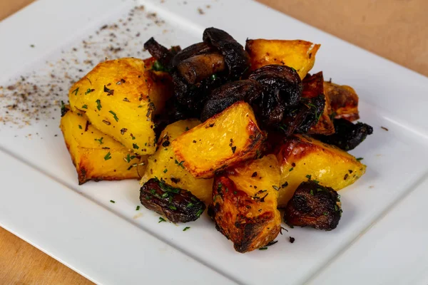 Roasted potato with mushrooms and spices