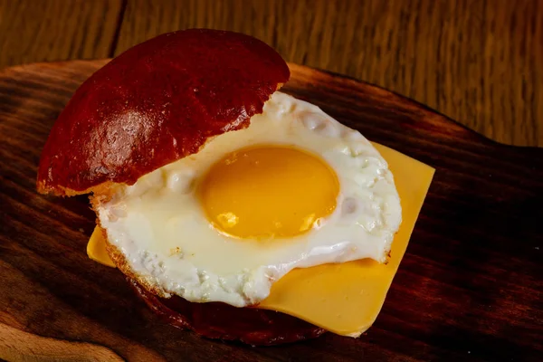 Burger with egg and cheese