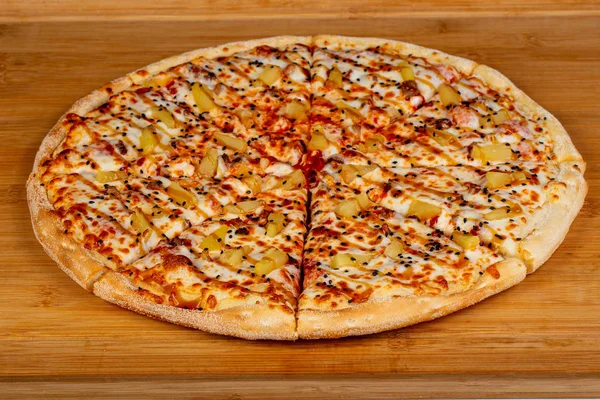 Pizza with pineapple and cheese