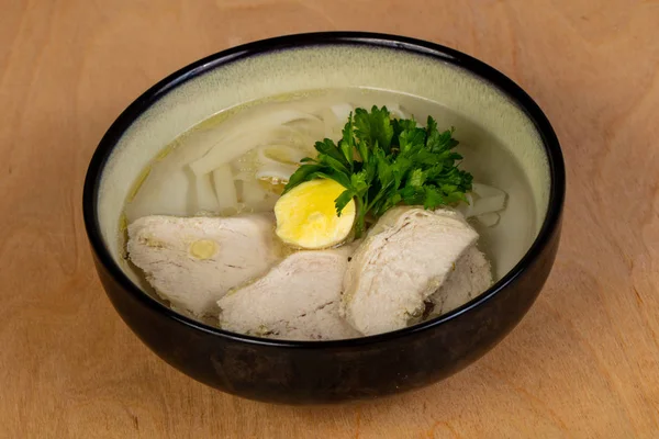 Light chicken soup with egg