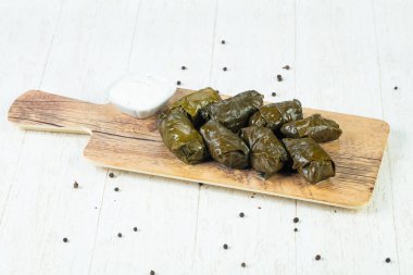 Traditional dolma grape leaves with meat clipart