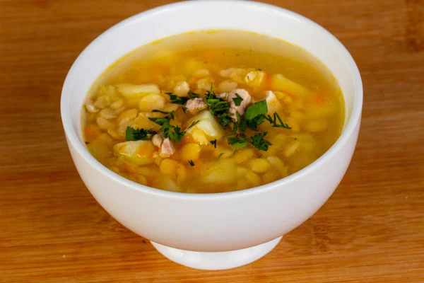 Pea soup with meat and parsley — Stock Image Pea Soup Meat Parsley Stock Image