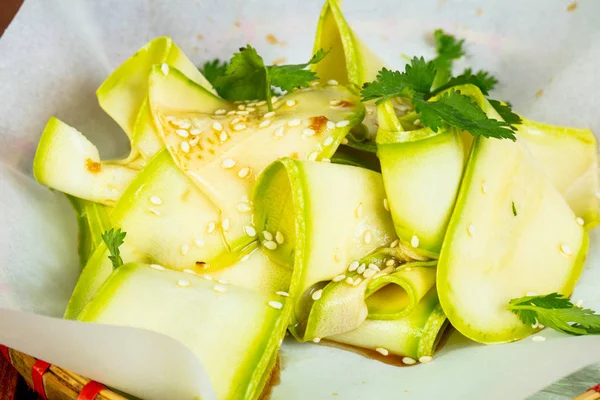 Vietnam Zucchini salad with sesam seeds