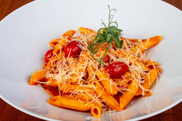 Delicious penne pasta with tomatoes