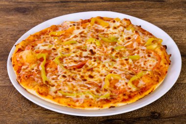 Pizza sarı dolmalık biber ile