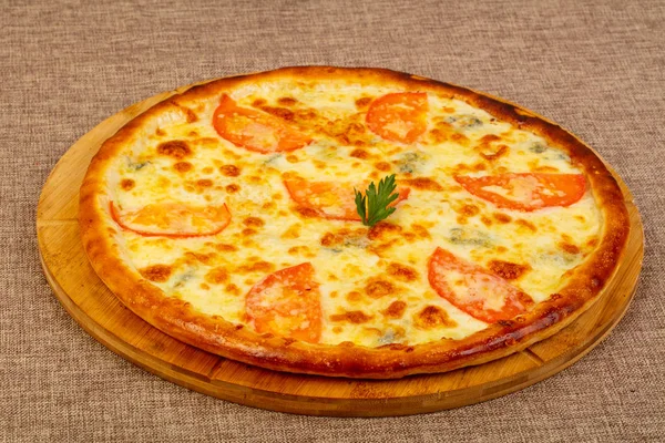 Pizza Margarita with cheese and tomatoes