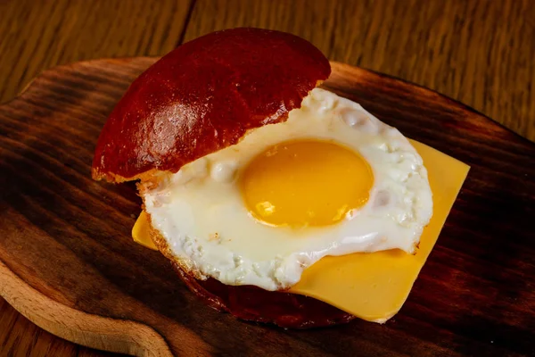 Burger with egg and cheese