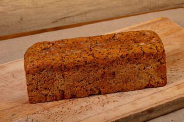 Ev yapımı lezzetli ekmek ahşap arka plan üzerine