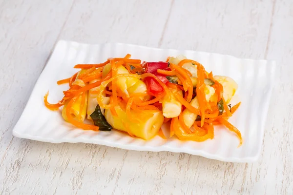 Delicious asian salad with marinated bamboo shoots and vegetables