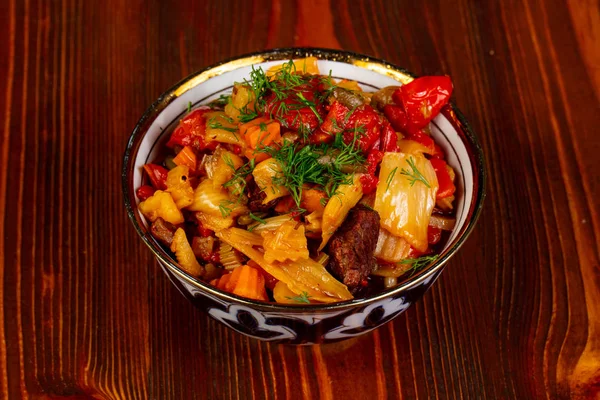 Uzbek traditional lagman over wooden background — Stock Image Uzbek Traditional Lagman Wooden Background Stock Photo