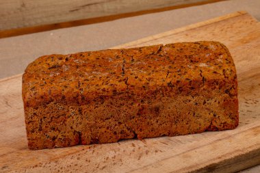 Ev yapımı lezzetli ekmek ahşap arka plan üzerine