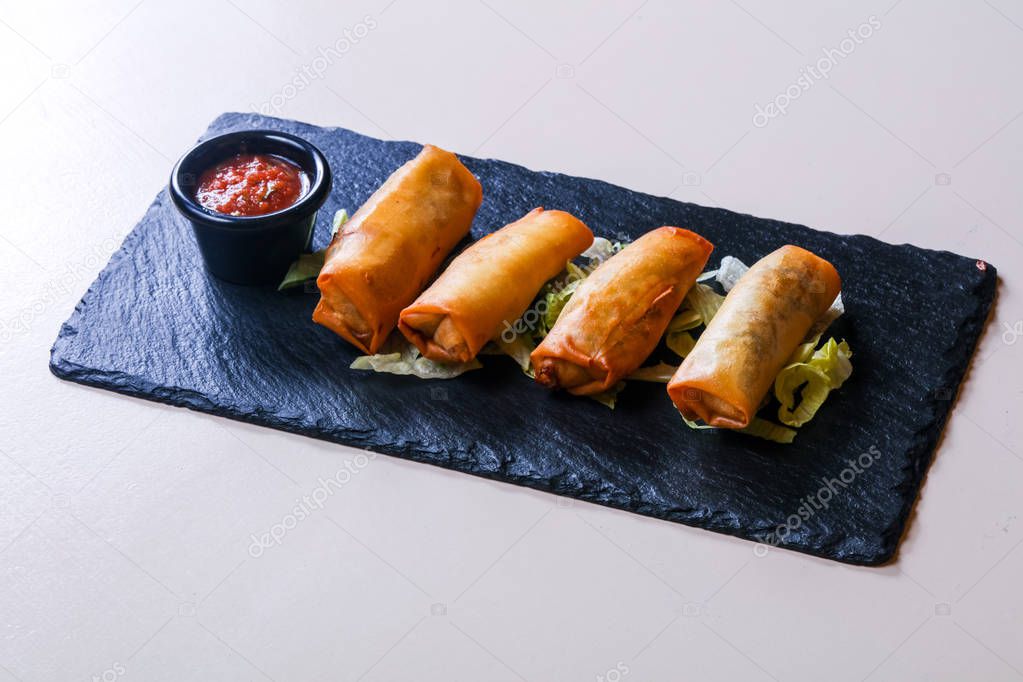 Spring roll with tomato sauce 