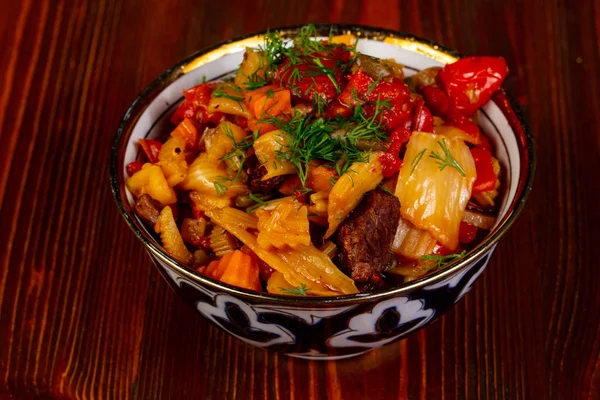 Uzbek traditional lagman over wooden background — Stock Image Uzbek Traditional Lagman Wooden Background Stock Photo