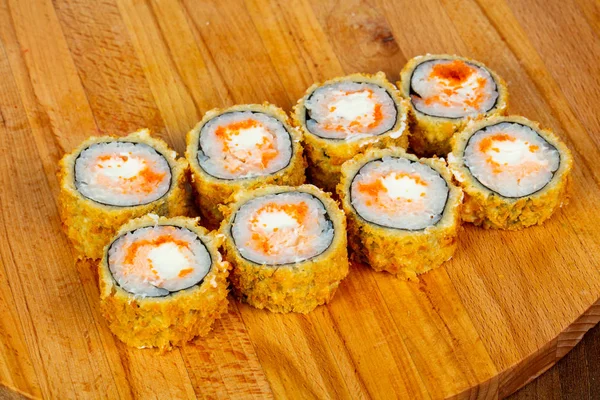 Hot roll with salmon and soft cheese