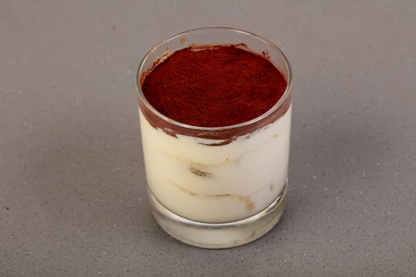 Sweet Tiramisu cake in the glass