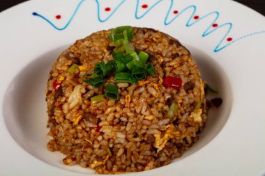 Fried rice with beef and spices clipart
