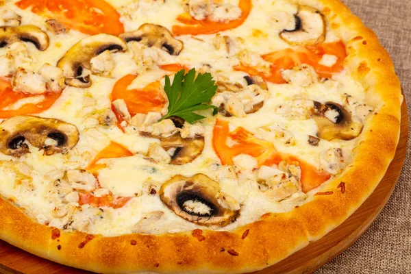 Pizza with mushroom, cheese and tomato