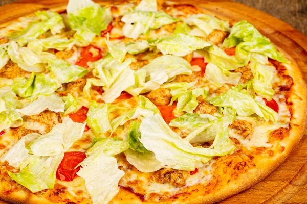 Pizza Caesar with chicken and salad