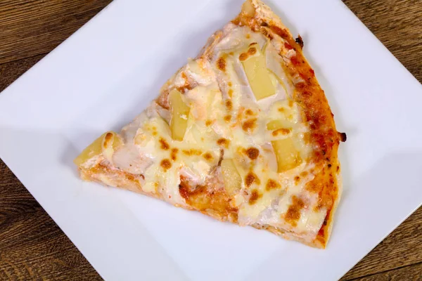 Pineapple pizza with soft cheese