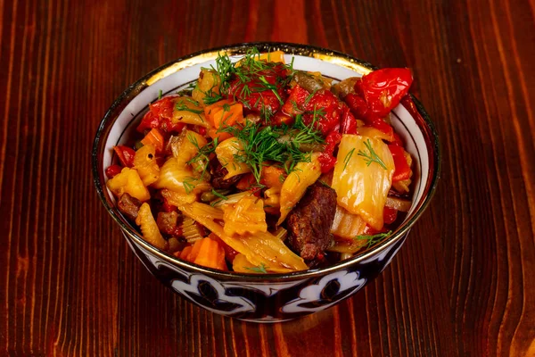 Uzbek traditional lagman over wooden background — Stock Image Uzbek Traditional Lagman Wooden Background Stock Image