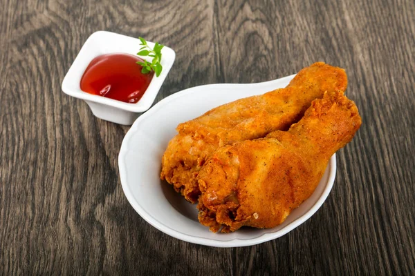 Crispy chicken legs with  ketchup