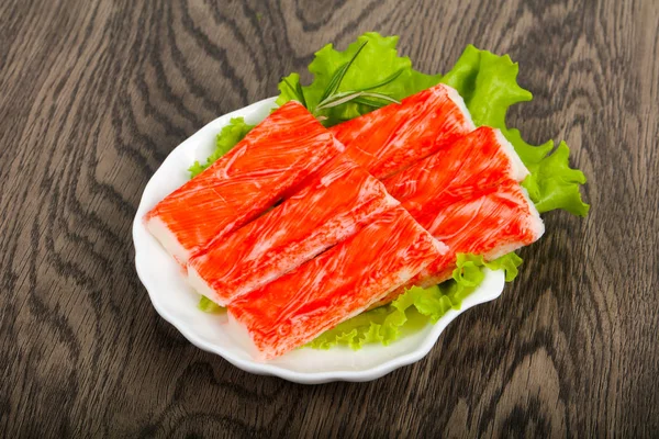 Crab Sticks Över Trä Bakgrunden — Stockfoto