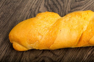 Baget ekmek ahşap arka plan üzerine