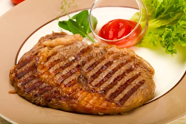 Grilled Rib eye steak with sauce