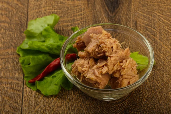 Canned tuna fish in the bowl ready for cooking