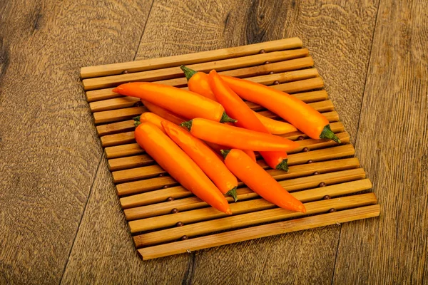 Hot Yellow Pepper Heap Wooden Background — Stock Photo, Image