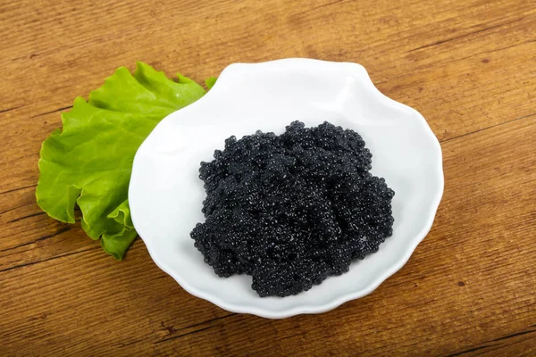 Tigela Caviar Preto Sobre Fundo Madeira — Fotografia de Stock