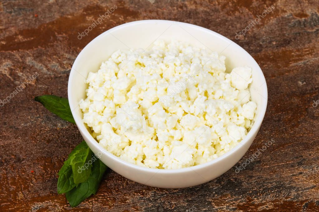Natural cottage cheese served mint leaves