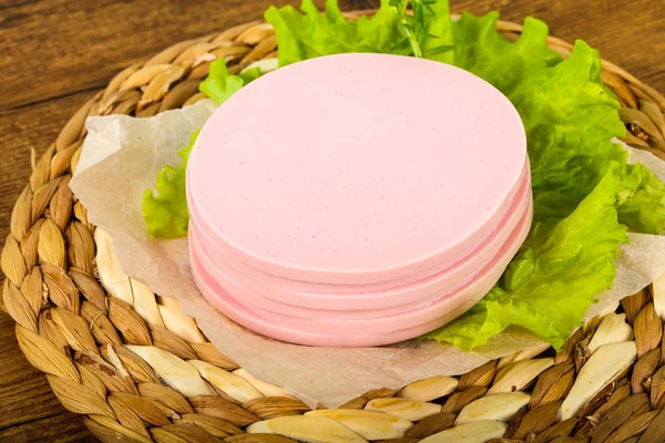 Sliced Sausage Salad Leaves Wooden Background — Stock Photo, Image