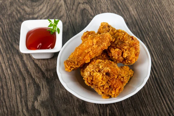 Crispy chicken wings with  ketchup