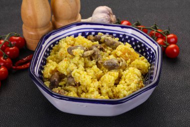 Tavuk kalbi ve baharatlı pilav.