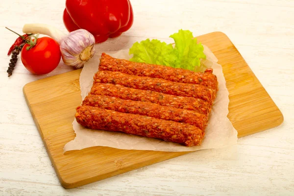 Raw beef sausages — Stock Photo, Image