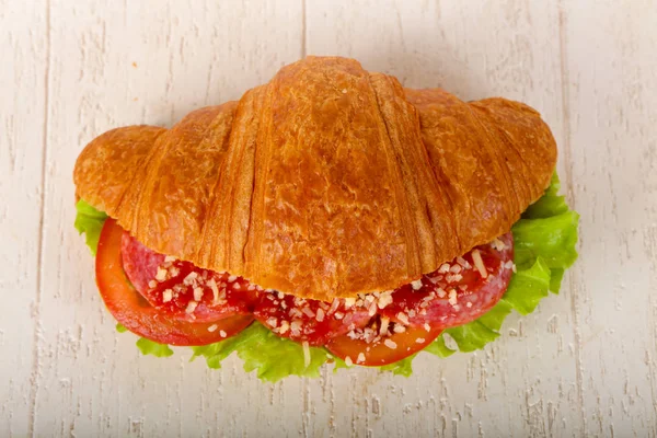 Croissant with meat — Stock Photo, Image