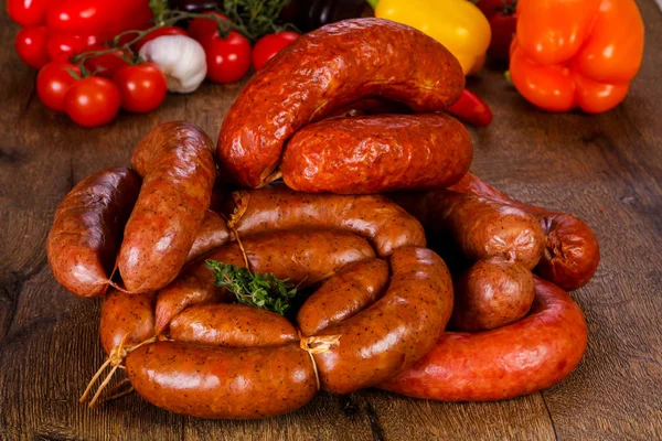 Pork sausages over wooden — Stock Photo, Image