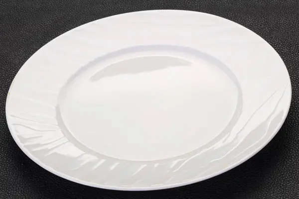 Empty white plate Royalty Free Stock Images