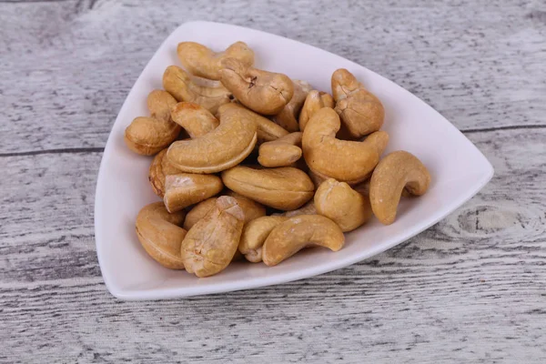 Cashew nuts heap in the bowl — Stock Photo, Image