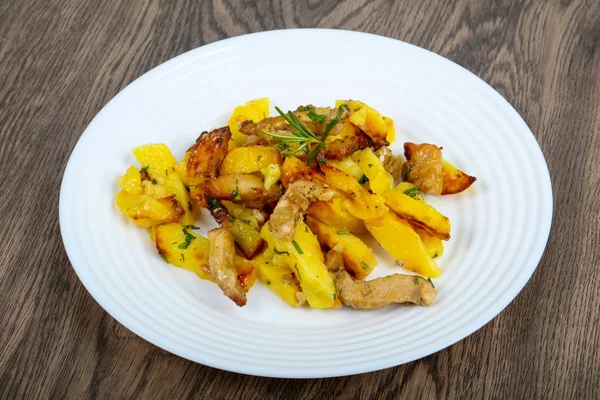 Fried potato with pork — Stock Photo, Image